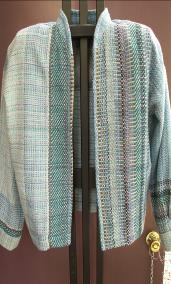 silver blue jacket on manniken